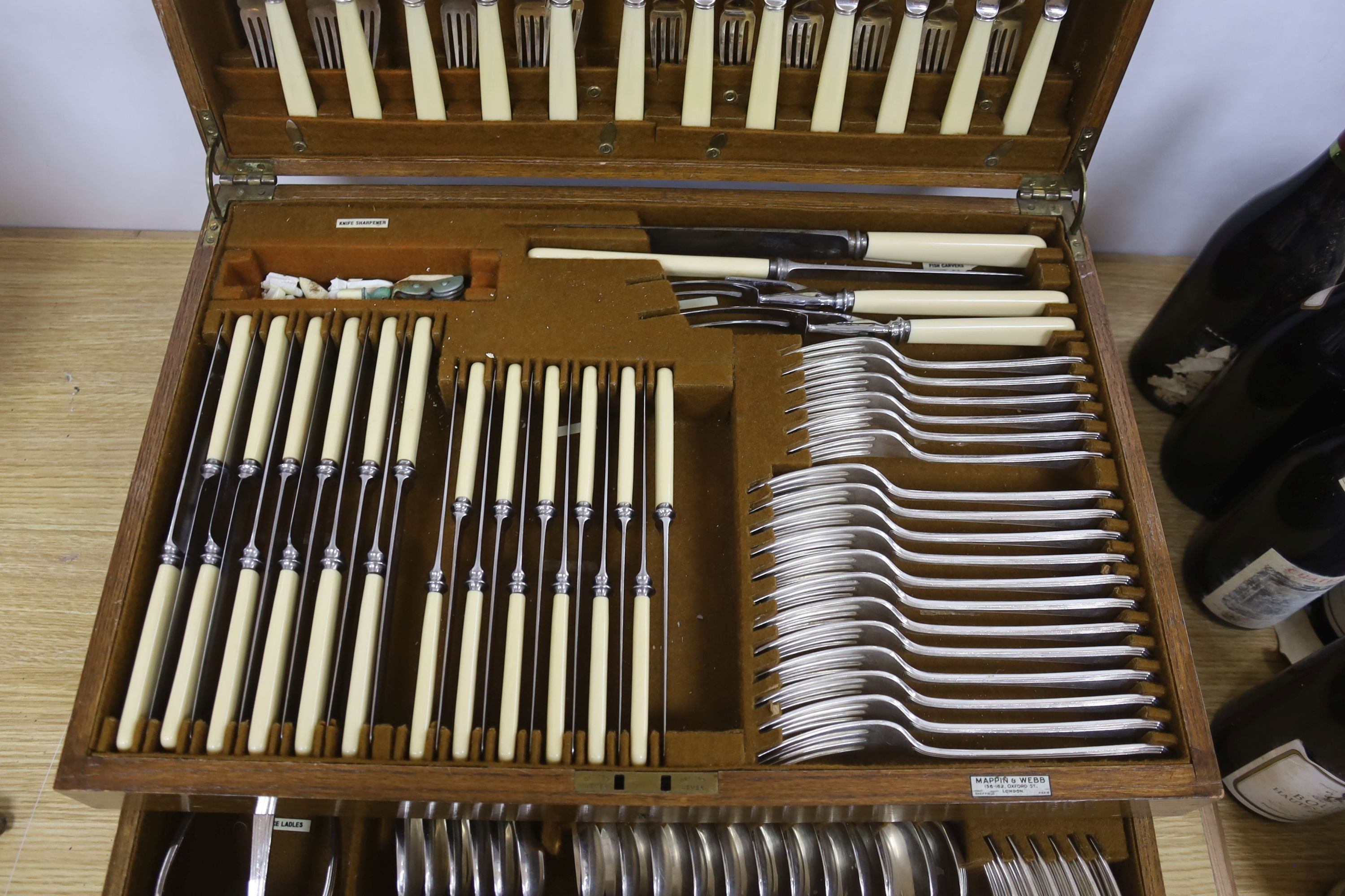 A Mappin and Webb oak cased canteen of plated flatware (113 pieces)